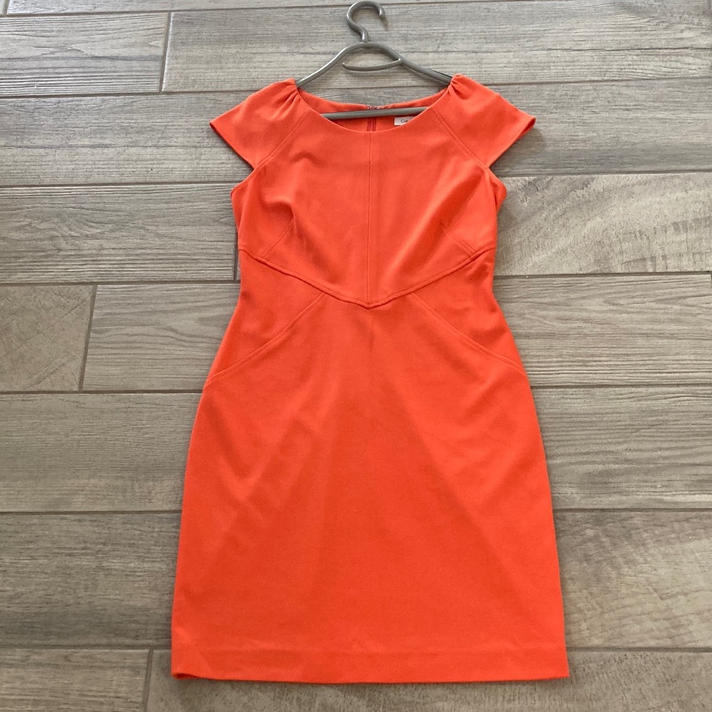 Beautiful, bright orange, shift dress from Calvin Klein. Size 8.
